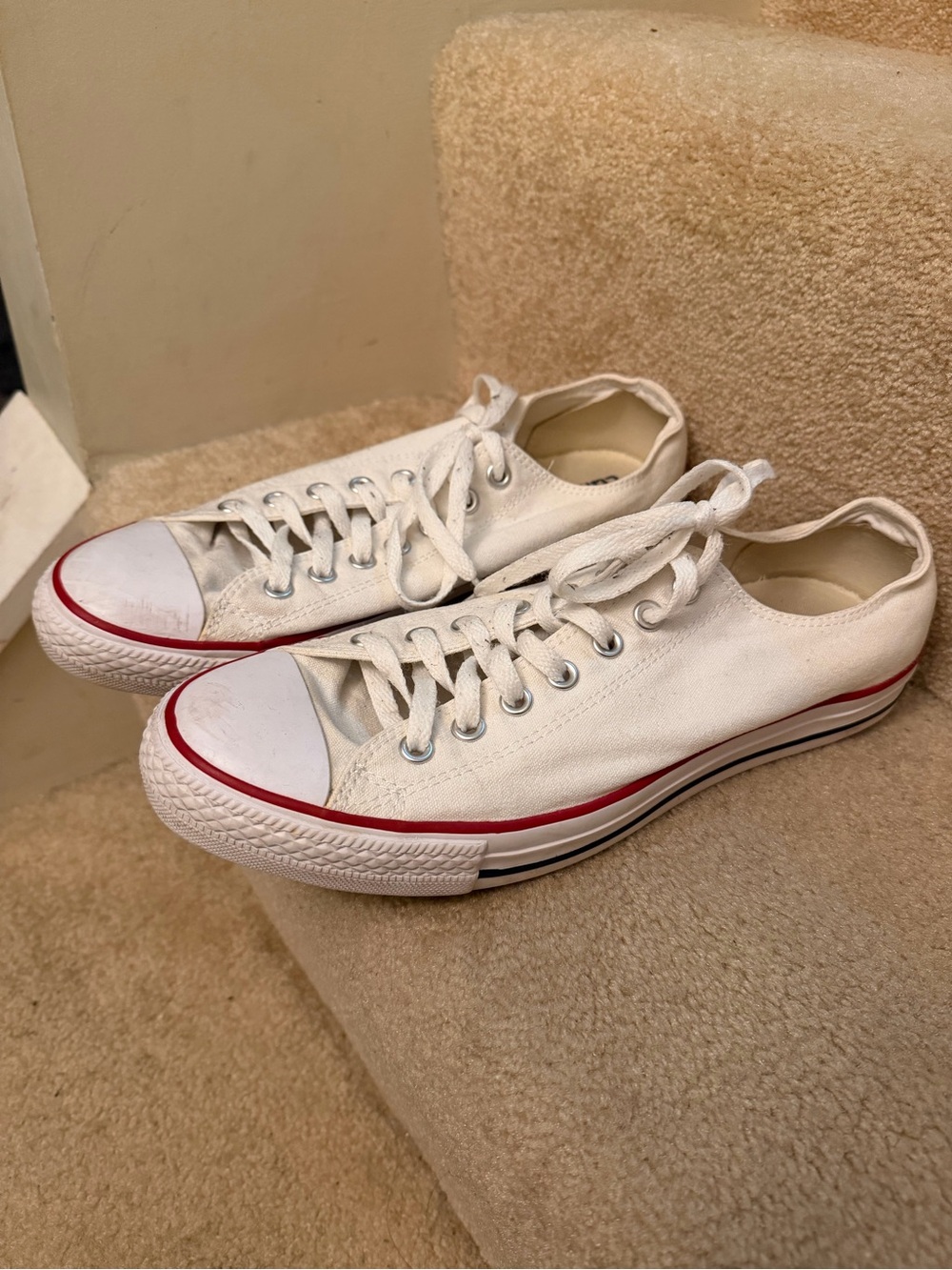 Converse Low Top Canvas Sneakers in White with Red Trim